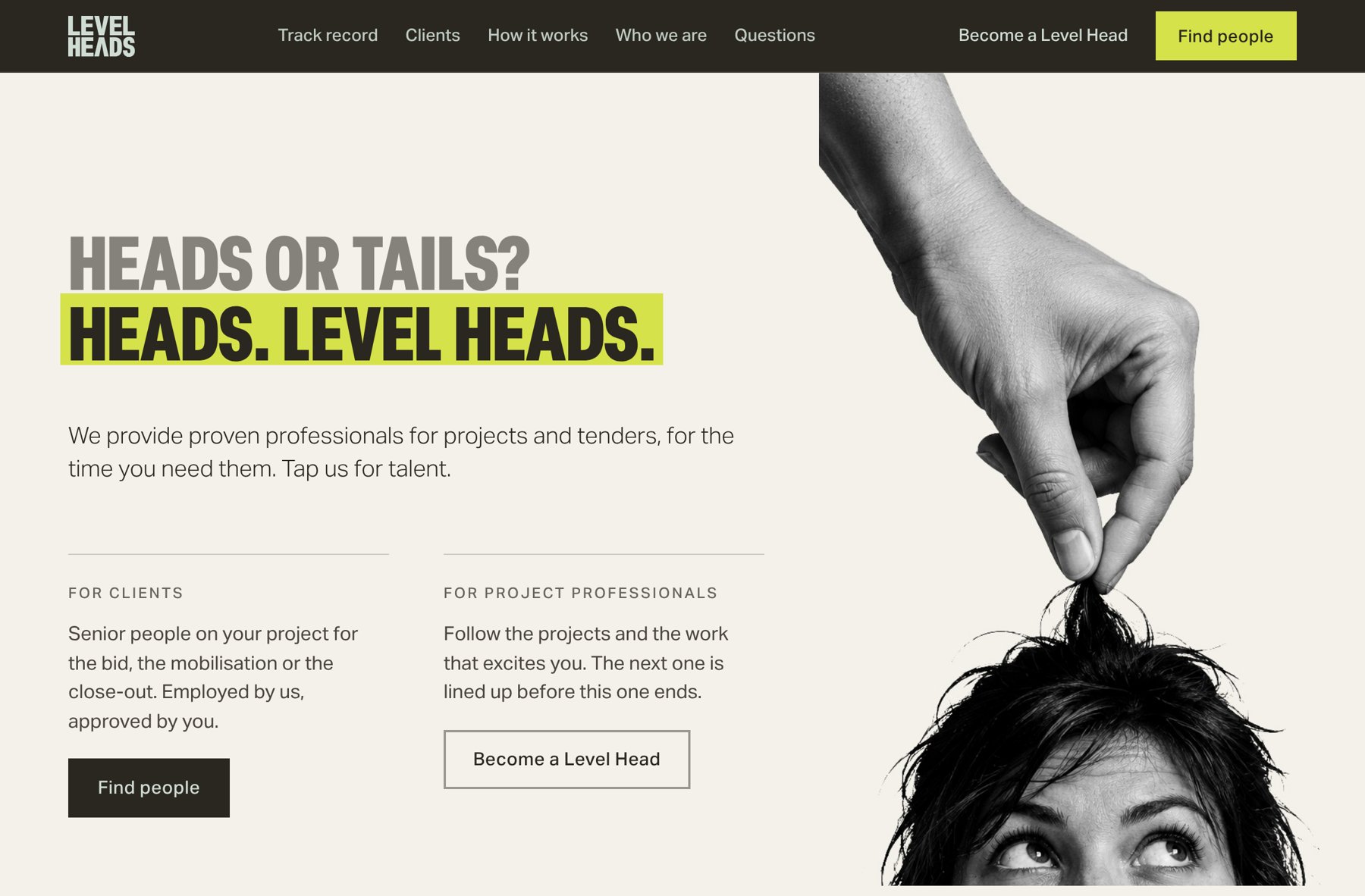 Level Heads website home page: the headline Heads or tails? Heads. Level Heads. in lime, beside a black and white photo of a hand picking a person up by the hair