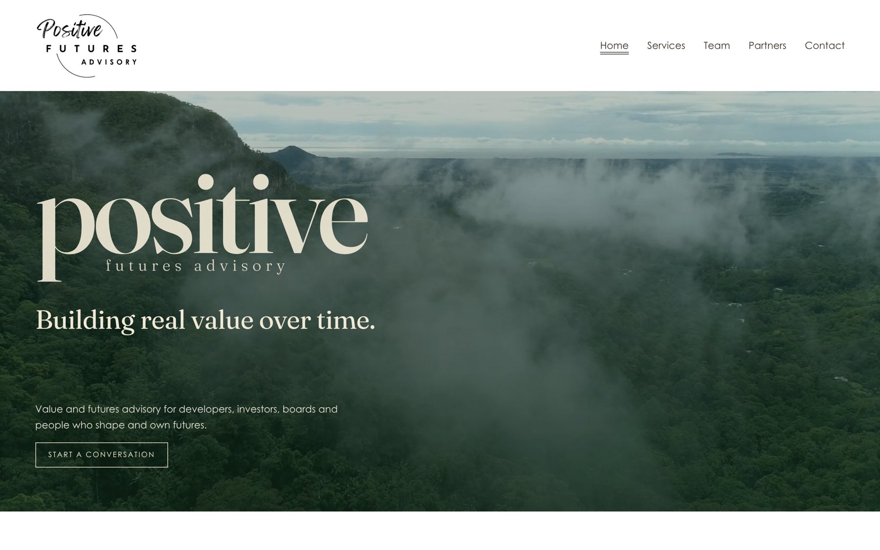 Positive Futures Advisory website home page: the word positive in large serif type over aerial video of rainforest and cloud, with the line Building real value over time.